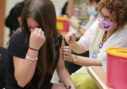 sraeli teen receives the coronavirus vaccine 24