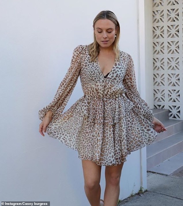 Former Hi-5 singer Casey Burgess flaunts her stunning shape in a provocative bikini while swimming in Clovelly... after a man once told her she 'needed to get her boobs done.' Former Hi-5 singer Casey Burgess flaunts her stunning shape in a provocative bikini while swimming in Clovelly... after a man once told her she 'needed to get her boobs done.'