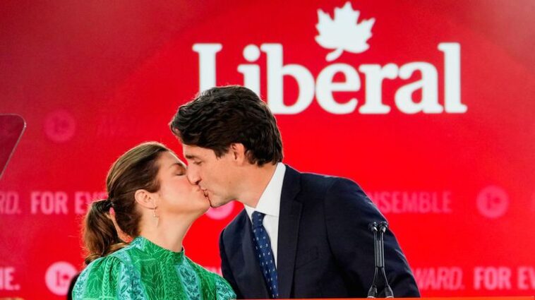 Canadian Prime Minister Justin Trudeau kisses his wife Sophie Gregoire