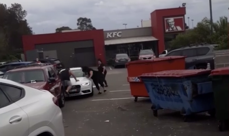 Two people have been arrested after an altercation broke out at a parking lot in south western Sydney. Facebook