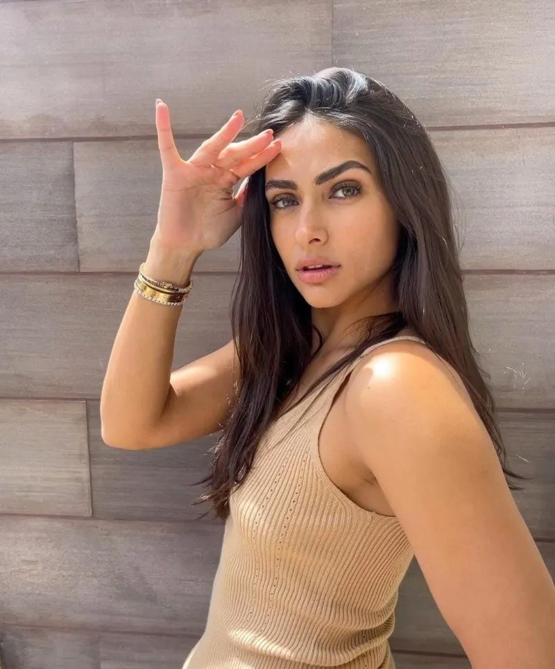 Renata Notni models her incredible black swimsuit from the beaches of Turkey