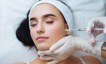smile lifting lip augmentation beautician doctor hands doing beauty procedure female face wit e1654092520970