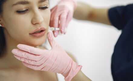 woman with doctor cosmetology studio