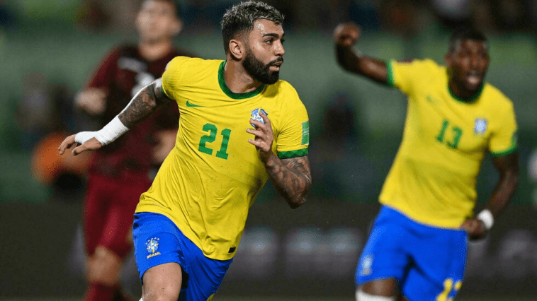 Brazil defeats Venezuela 3-1 to keep their perfect record heading into the World Cup. Brazilian Gabriel Barbosa left celebrates after scoring against Venezuela during the South American qualifying soccer match for the Qatar 2022 FIFA World Cup at the UCV Olympic Stadium in Caracas on