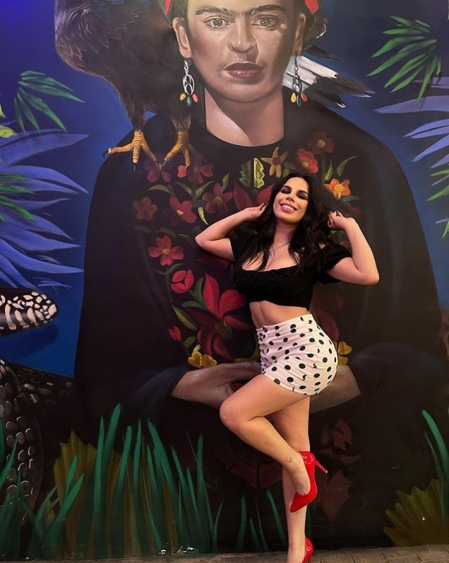 Lizbeth Rodrguez wears a tiny bikini at the rear to show off her curves.