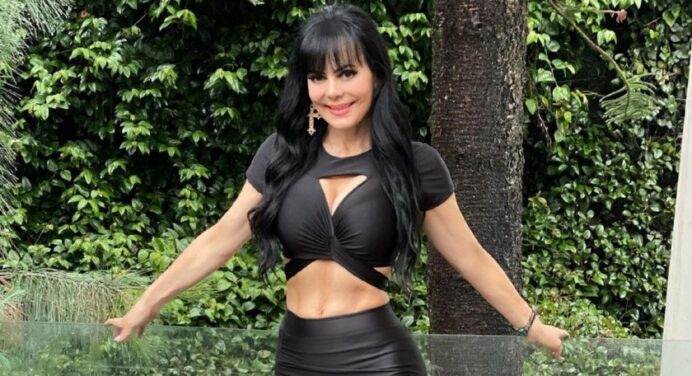 Maribel Guardia shows off her toned abs from her home gym.