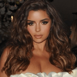 Demi Rose causes a sensation by showing off her great charms in a tight black outfit DEMI