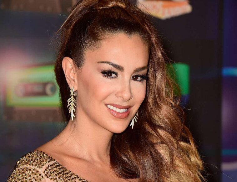 Ninel Conde shows off her treasures in a striking lemon green swimsuit Ninel Conde