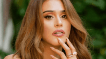 Yanet Garcia without anything on top shows off her curves with beautiful stitching