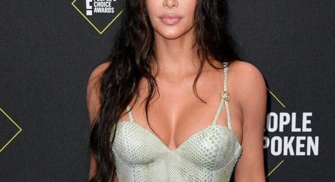 Why is Kim Kardashian holding hands with Pete Davidson when she is married to Kanye West?