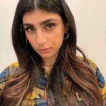 Mia Khalifa leaves her striking physique in a fiery little dress with a pronounced neckline mia khalifa is breaking the internet yet again with her insanely hot sun kissed bikini pictures were drooling 002