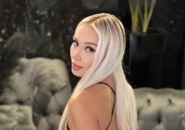 Daniella Chavez from the back and profile in a mini beach dress