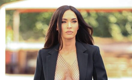 Megan Fox boasts tiny waist with cut out blouse