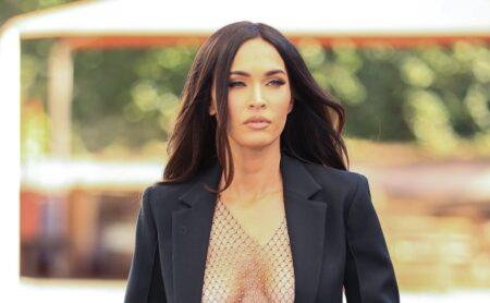 Megan Fox boasts tiny waist with cut out blouse