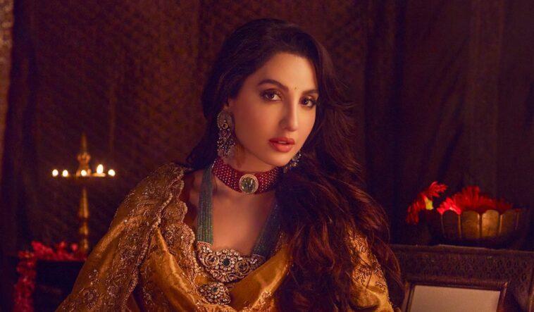 Nora Fatehi pushed the boundaries of bravery when she wore a jacket with buttons unfastened to reveal a bralette underneath. norafatehi 252573626 288385519847989 2980458662787625206 n e1644167594873