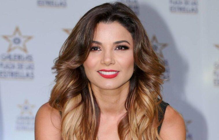 Aleida Nunez falls in love with her fans showing her shapely rear with a tiny neon pink bikini