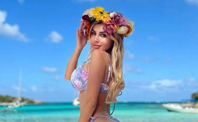 Alexa Dellanos models her sensational dress from the sand