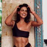 Barbara de Regil sunbathes in a mini swimsuit and shows off her stretch marks proudly