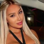 Daniella Chavez adds followers while stretching her band aid bikini