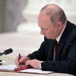 Russia on the brink of default: Bondholders still haven't received a $117 million payment due yesterday Russian President Vladimir Putin signs documents including a decree recognizing two Russian backed breakaway regions in eastern Ukraine as independent entities