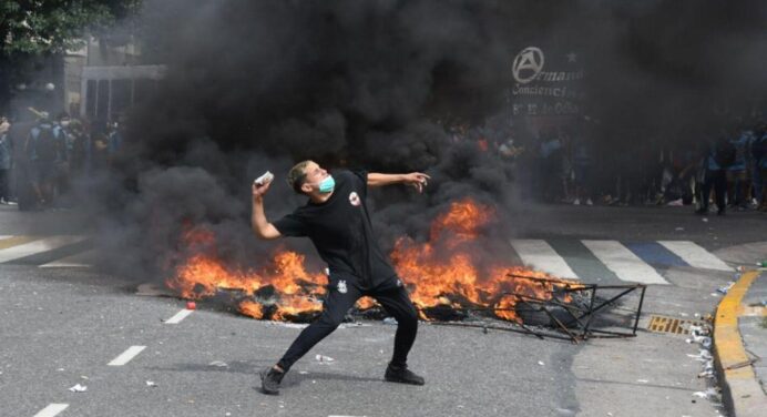 Protesters shattered the windows of Cristina Kirchner’s office during a protest against the IMF.