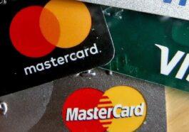 Visa and MasterCard restrict access to their networks to Russian banks.