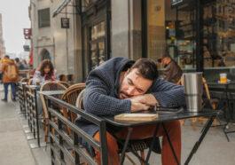 medium shot man sleeping table