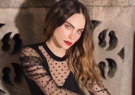 Belinda shows off her figure with a micro swimsuit lying on the sand VIDEO