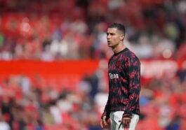 Manchester Uniteds Cristiano Ronaldo warms up before the English Premier League soccer match between Manchester United and Norwich City.