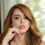 Yanet Garcia tempts from the front and above her ostentatious motorcycle