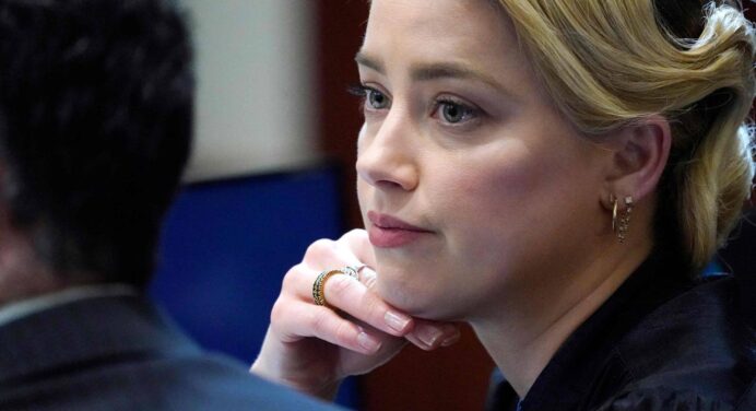 Amber Heard fires her PR team, upset by news about her
