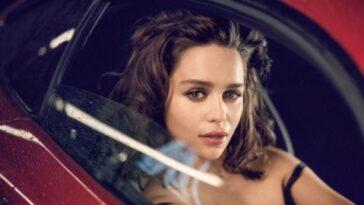 Emilia Clarke posing in the Mercedes Benz