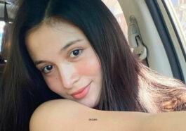 Outdoors Pandora Kaaki accommodates her beautiful overflows in a tropical bikini