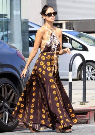 Eiza González sweeps with braless style spring dress in LA