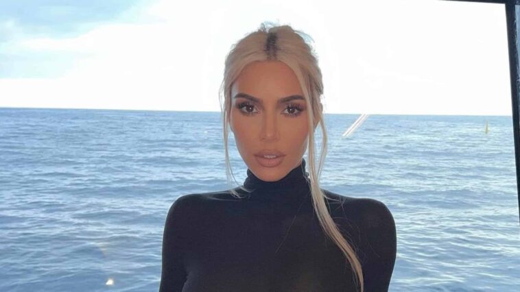 9 Stunning Looks That Show Off Kim Kardashian's Devotion To Balenciaga kim banner