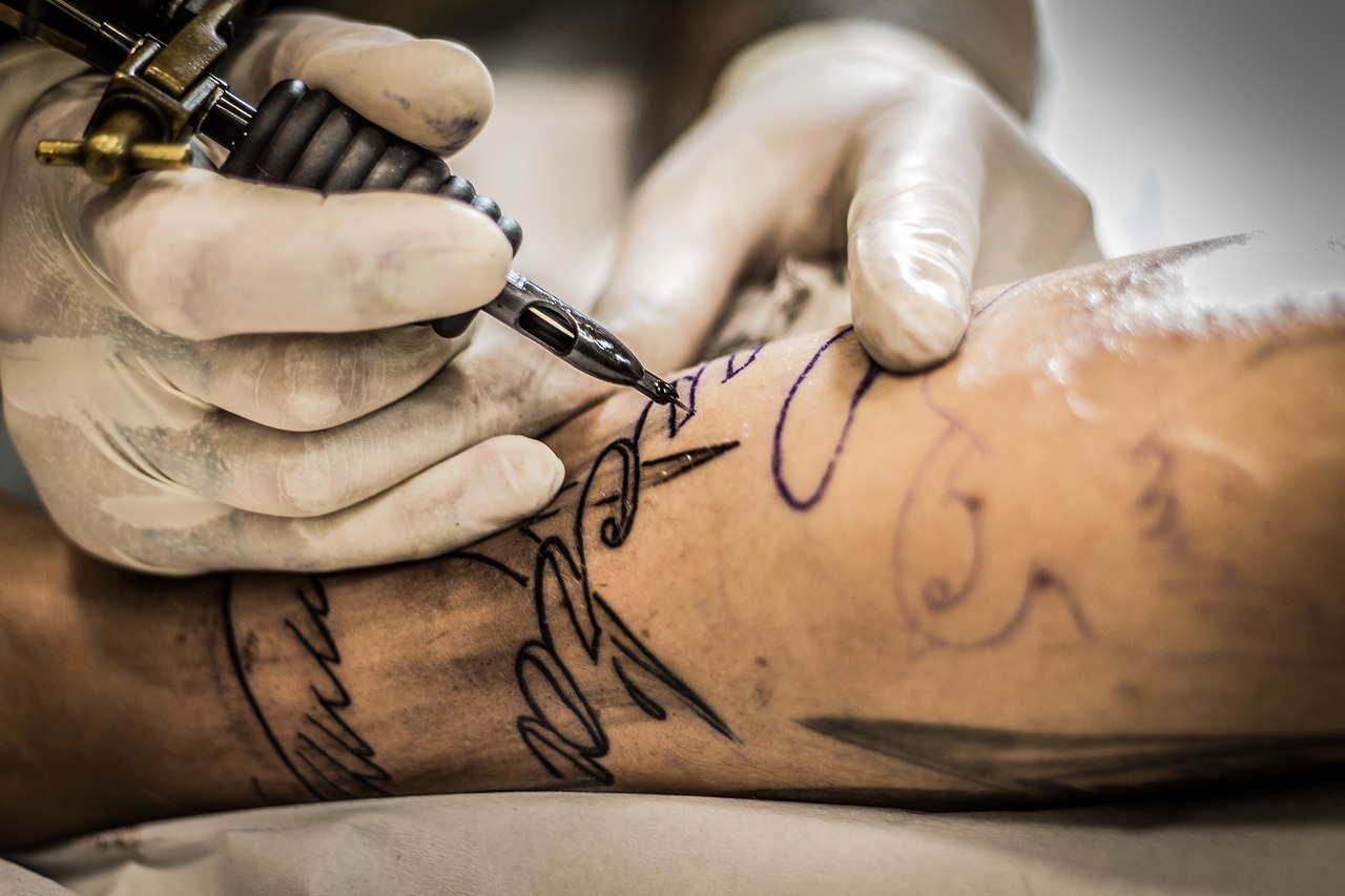 Exploring the Risks of Getting a Tattoo 2 Weeks Before Surgery tattoo, tattoo artist, arm