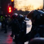 21 members of the Latin Kings arrested and seized drugs in Florida people in black jacket and helmet on street during daytime