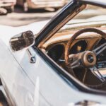 How to report a stolen car white vehicle parks on road during daytime