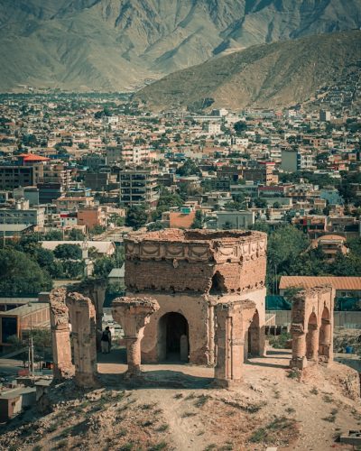 a city with a mountain in the background